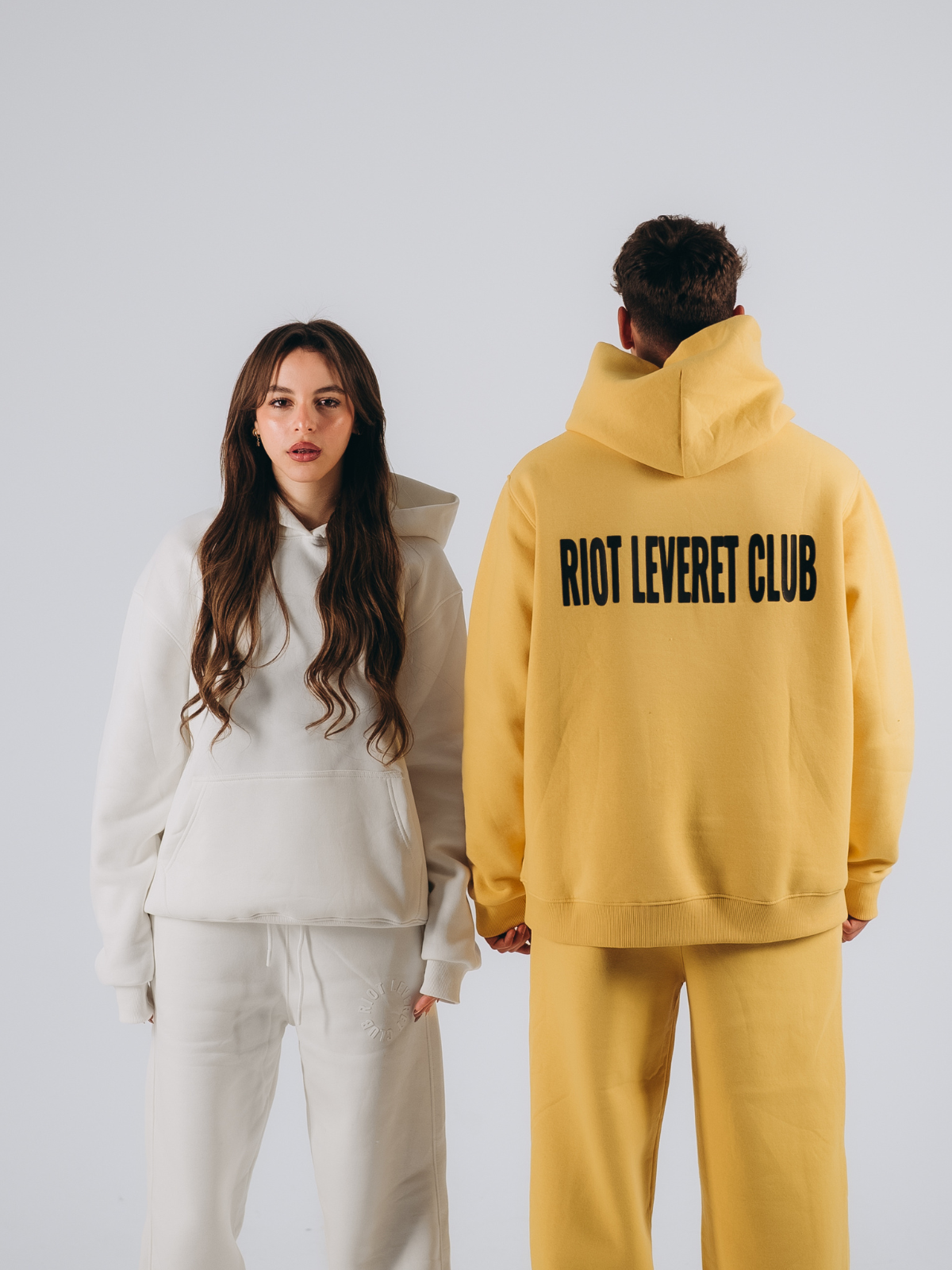Unisex off-white and Yellow oversized hoodie, designed for effortless comfort and minimalist style, made from premium fleece fabric."