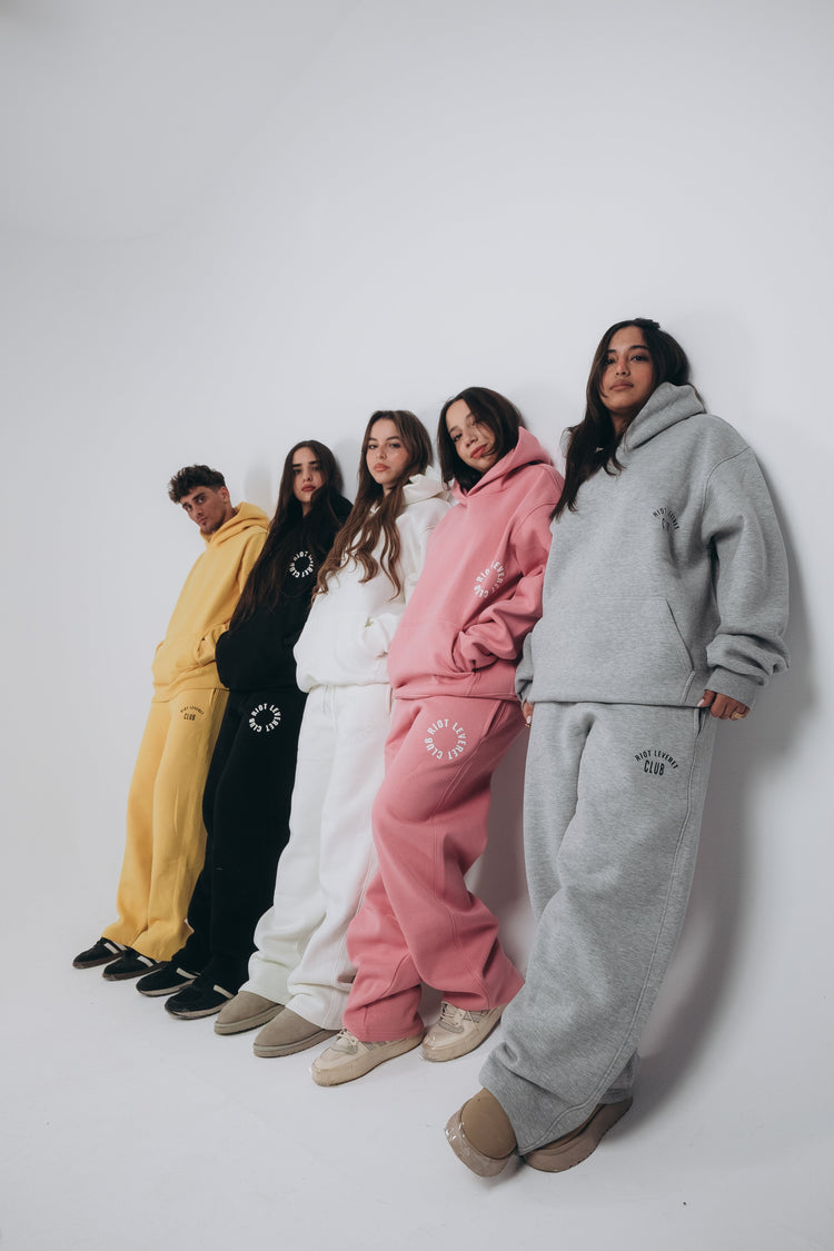 Five models are wearing premium Hoodies and sweatpants Set in different colors