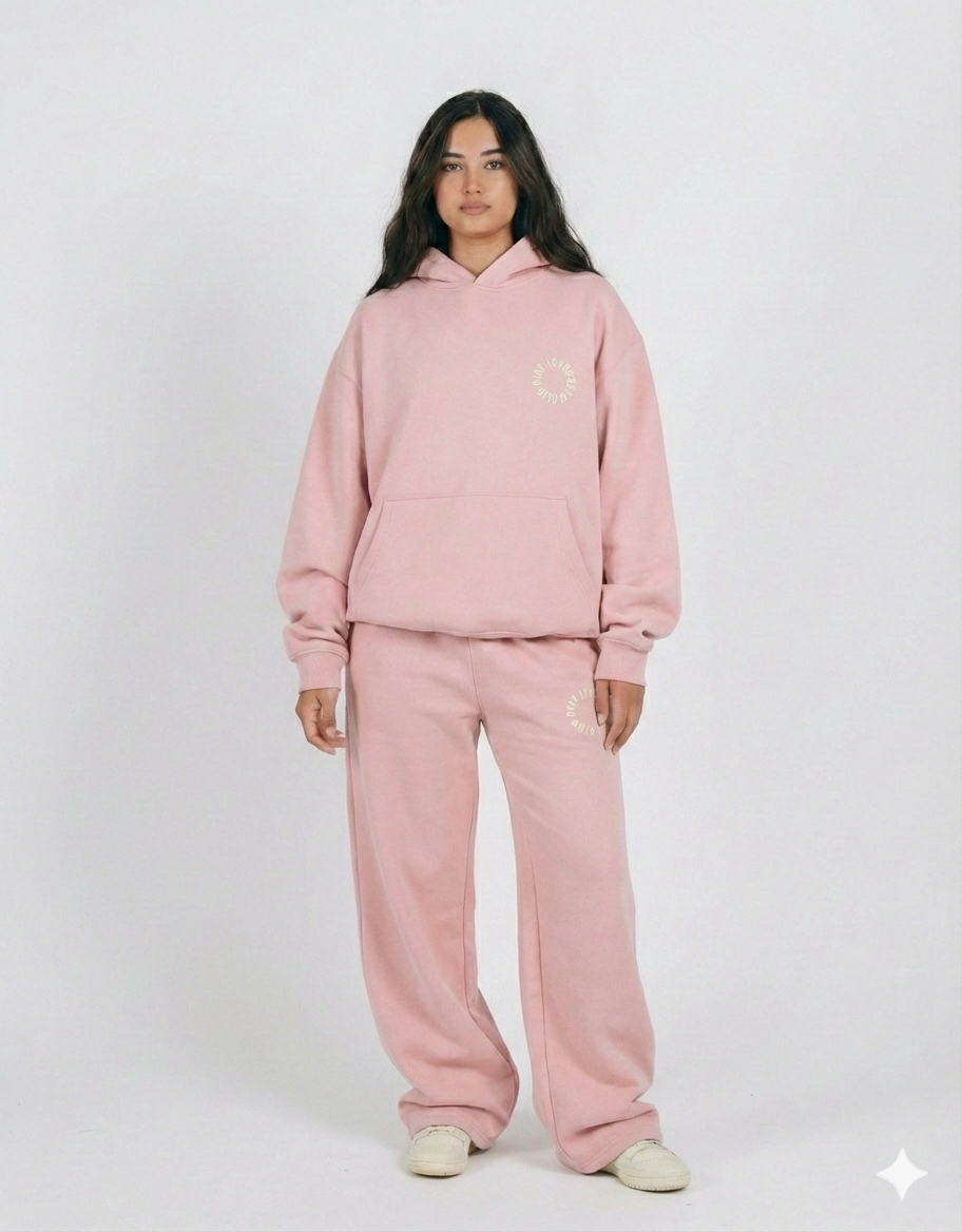 A model wears ping wide leg set and oversized hoodie from Riot Leveret Club