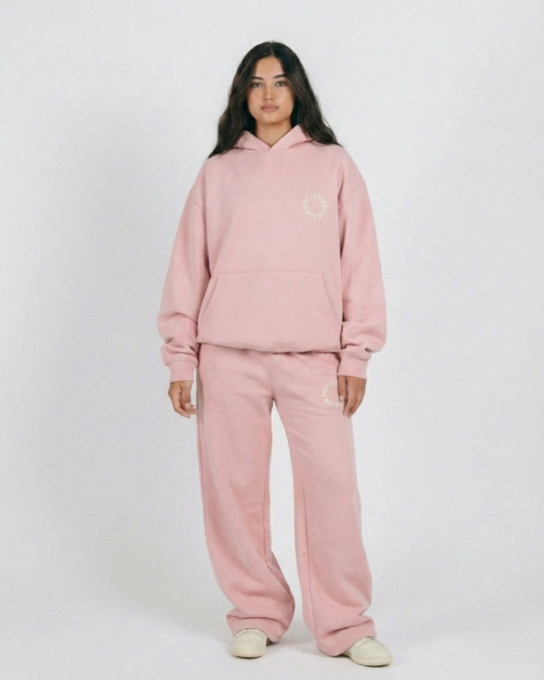 A model wears ping wide-leg set and oversized hoodie from Riot Leveret Club