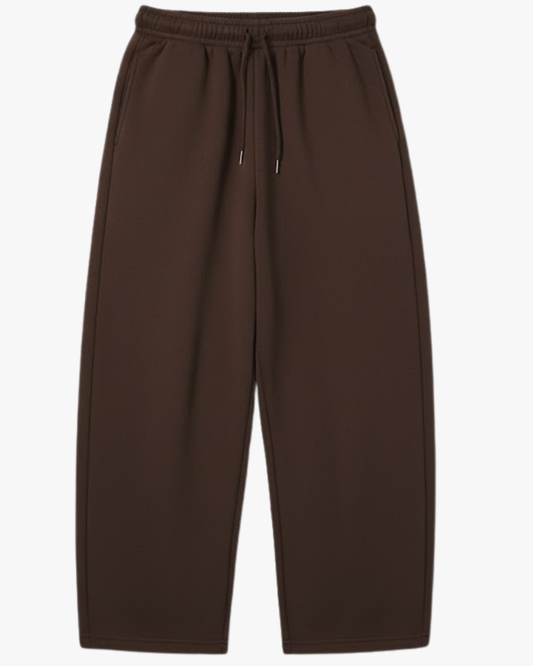Riot Leveret Club Burrow Balloon Sweatpants in brown. Features a rounded voluminous leg silhouette and a sharp ankle cinch in 500 GSM heavyweight French Terry.